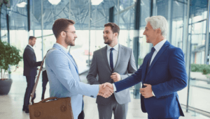 A group of businessmen meeting in a lobby