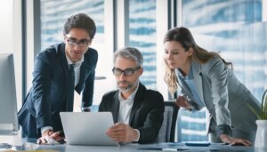 business people reviewing information on a computer