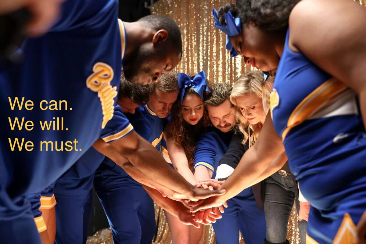 Cheerleaders from the TV show Stumble forming a circle with the words: We can. We will. We must.