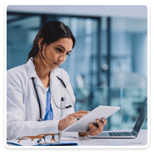 Doctor reviewing information on a tablet