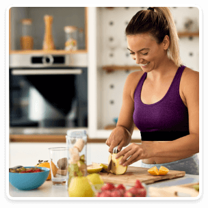 Fitness - Woman cooking at home